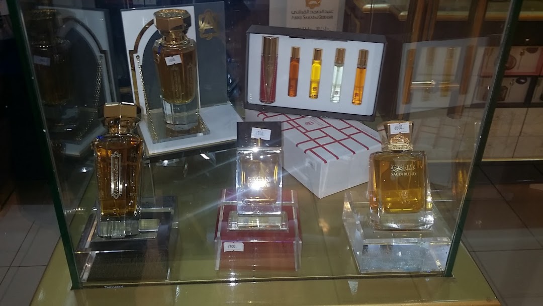 Display of luxurious perfumes in elegant bottles at Abdul Samad Al Qurashi.