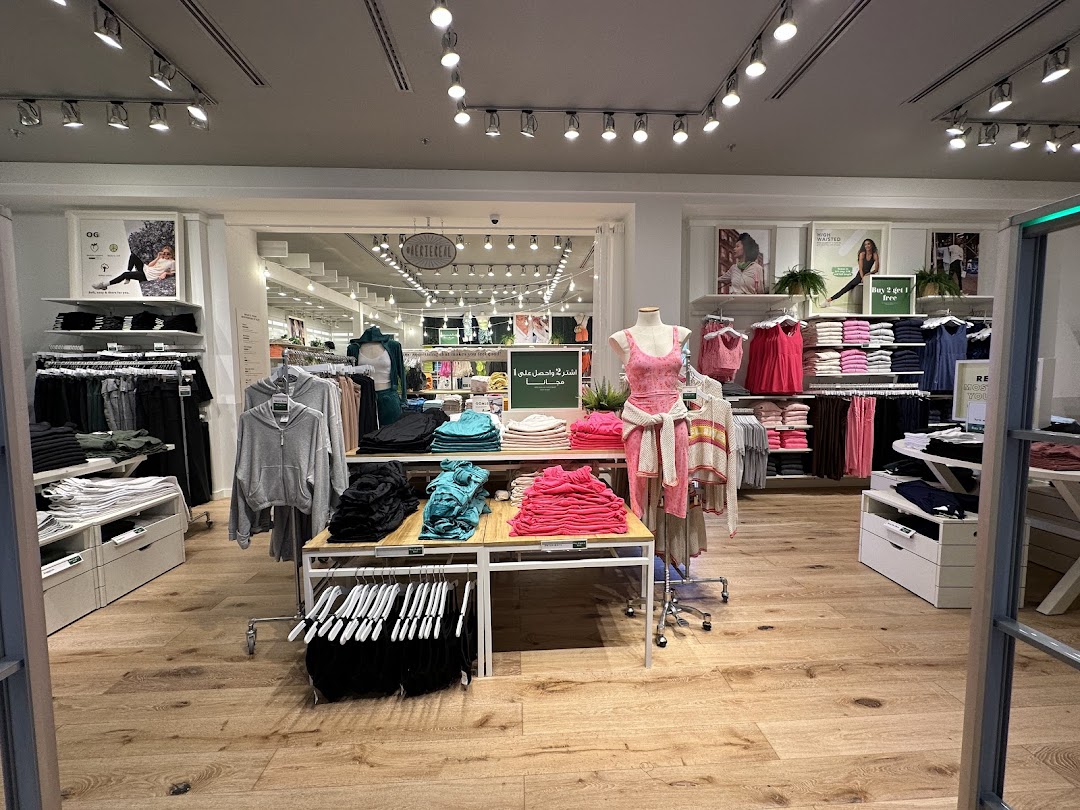 Interior view of an Aerie store showcasing a variety of casual apparel and activewear.