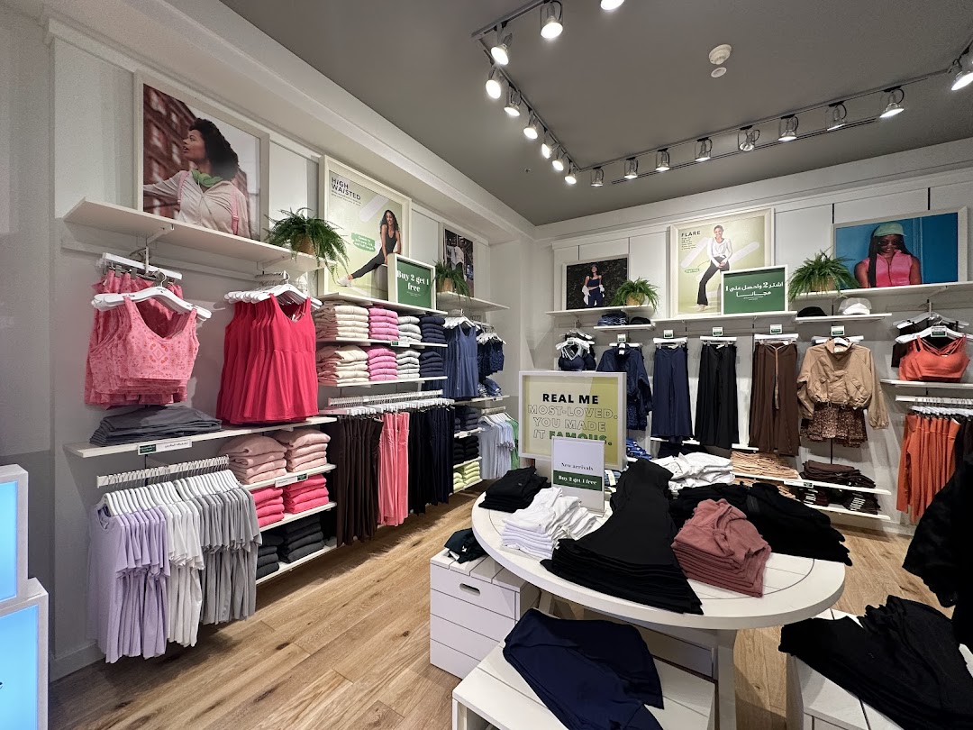 Interior view of an Aerie store showcasing a variety of women's apparel, including activewear and casual clothing.