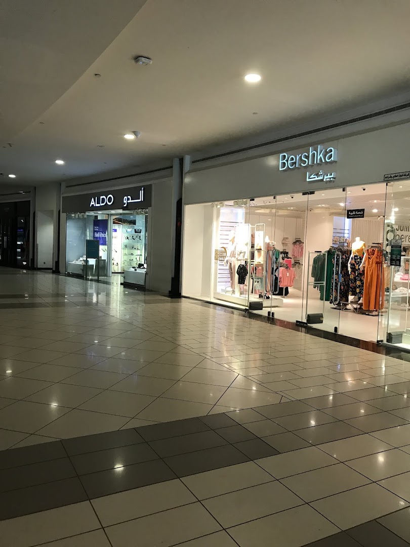The exterior of the Aldo and Bershka stores in a shopping mall.