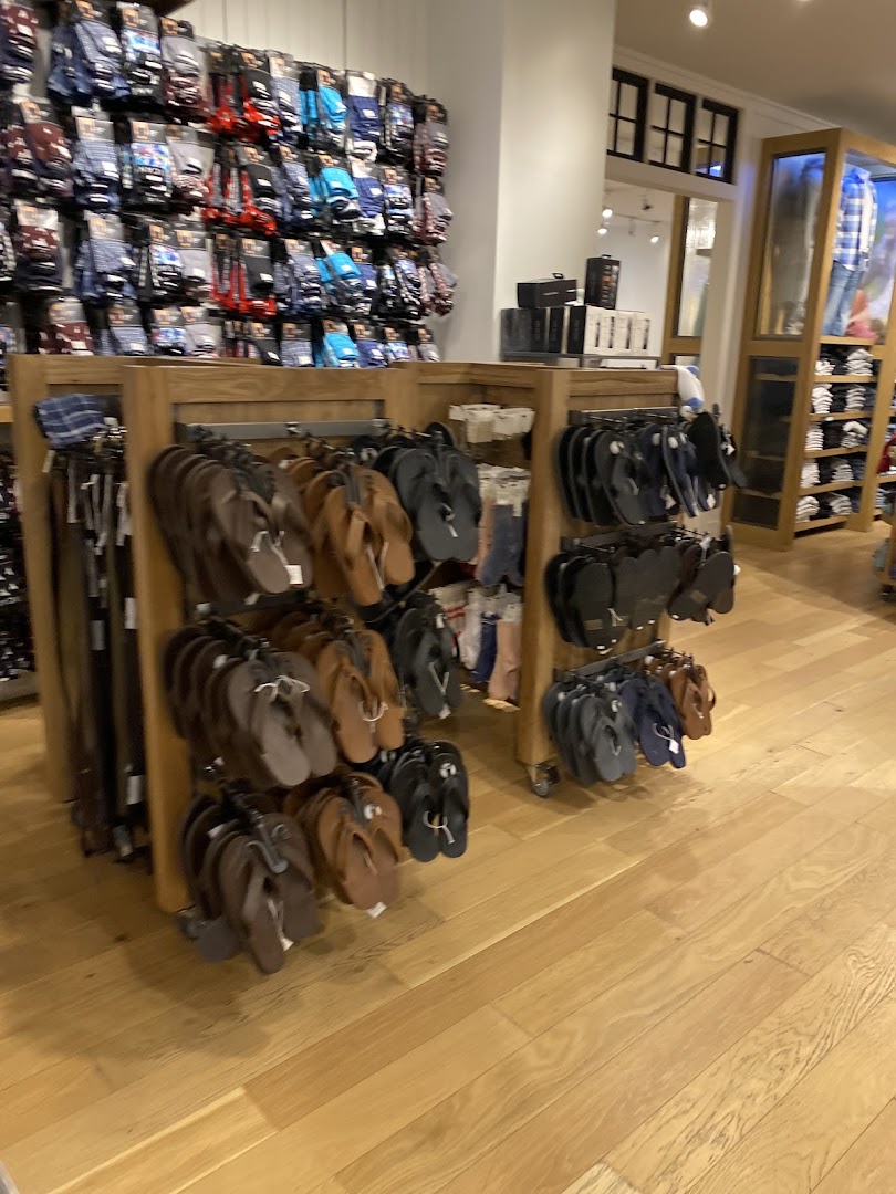 Interior view of an American Eagle store showcasing socks and flip-flops on display.