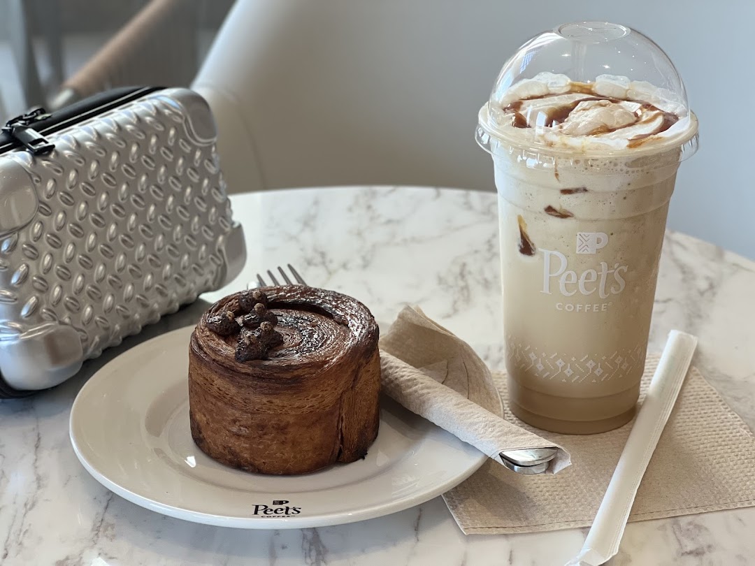 A delicious pastry and a caramel iced coffee from Peet's Coffee.