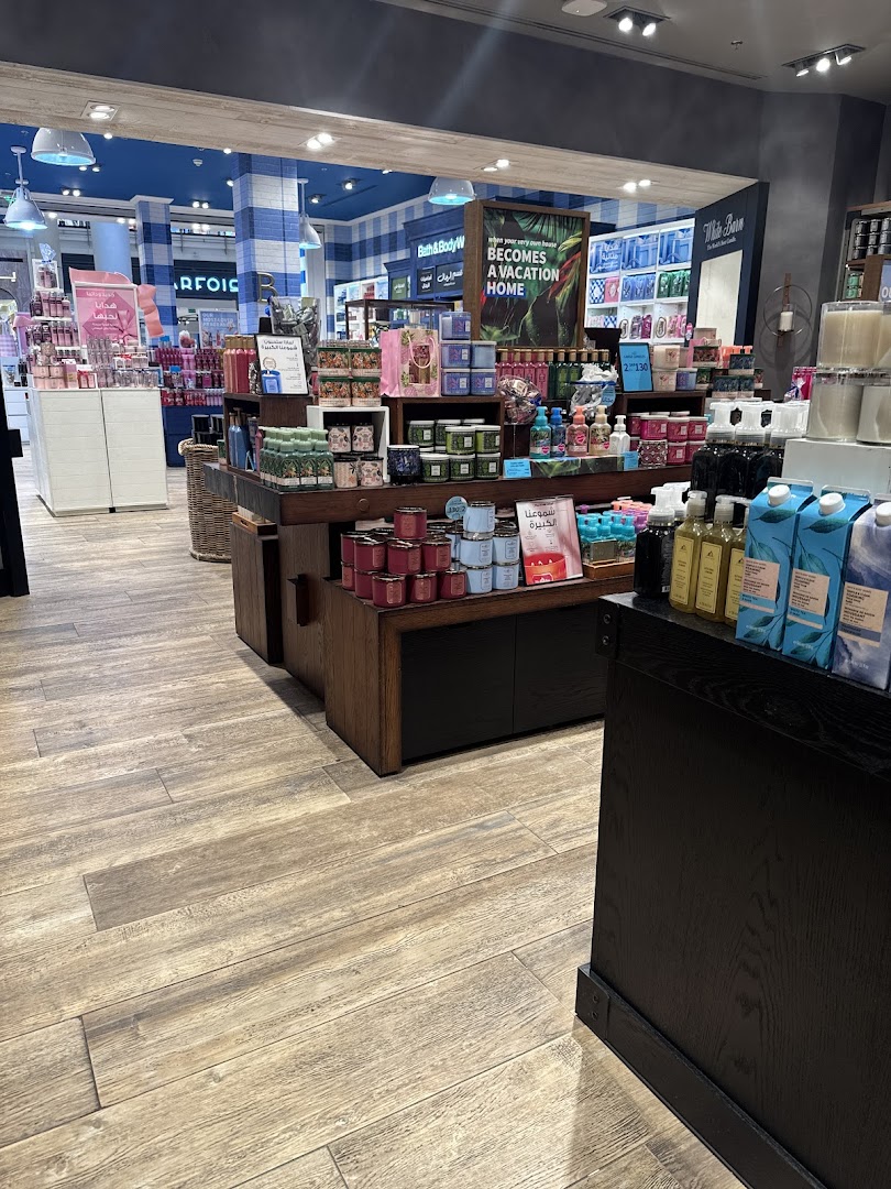 Interior view of a Bath & Body Works store showcasing various scented candles and body care products.