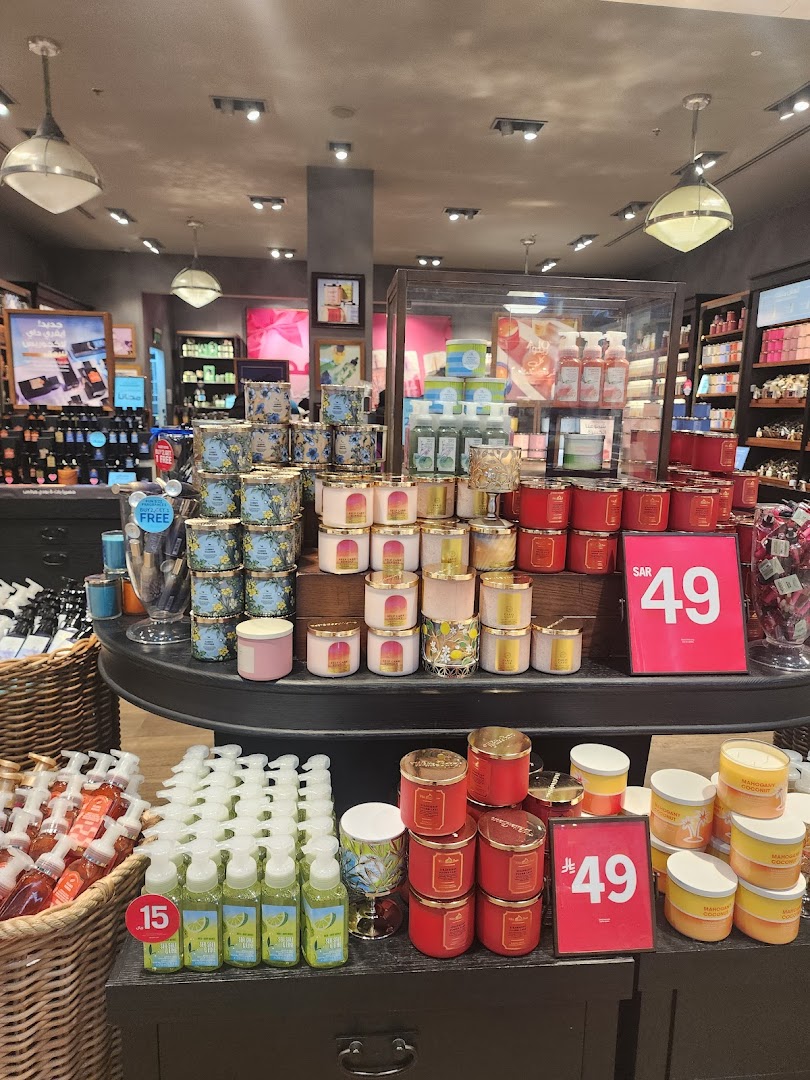 A display of various scented candles and hand soaps at Bath & Body Works.