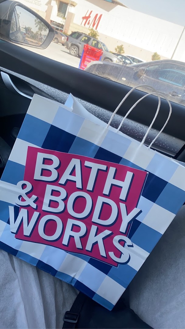 A Bath & Body Works shopping bag with its logo is prominently displayed.