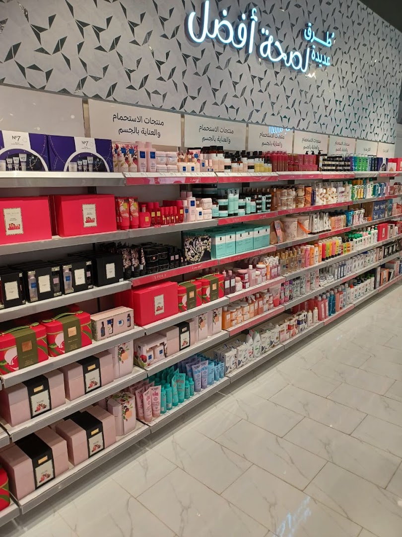 Shelves stocked with a wide variety of beauty and personal care products, including gift sets and skincare.