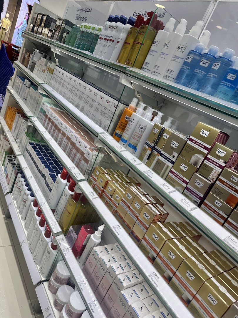 Shelves stocked with various skincare products, including creams, serums, and lotions from brands like ROC and Lierac.