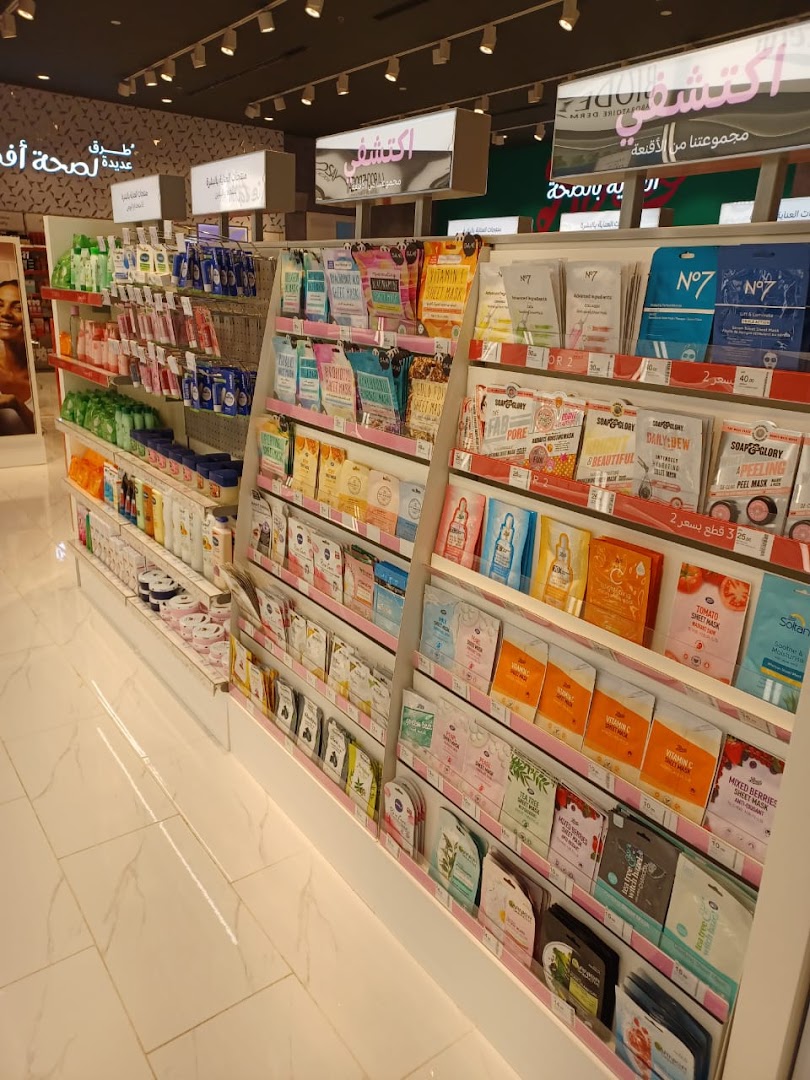 A wide selection of face masks and skincare products displayed on shelves in a retail store.