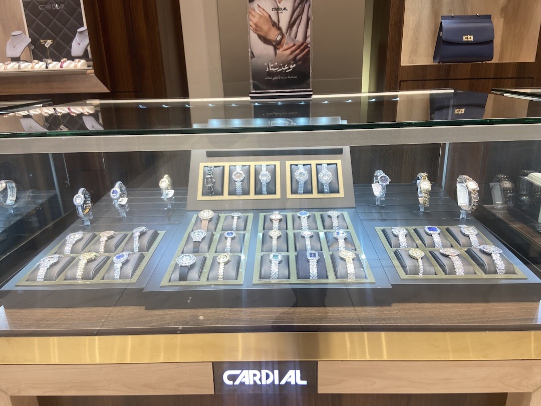 A display case filled with elegant watches, showcasing various styles and designs.