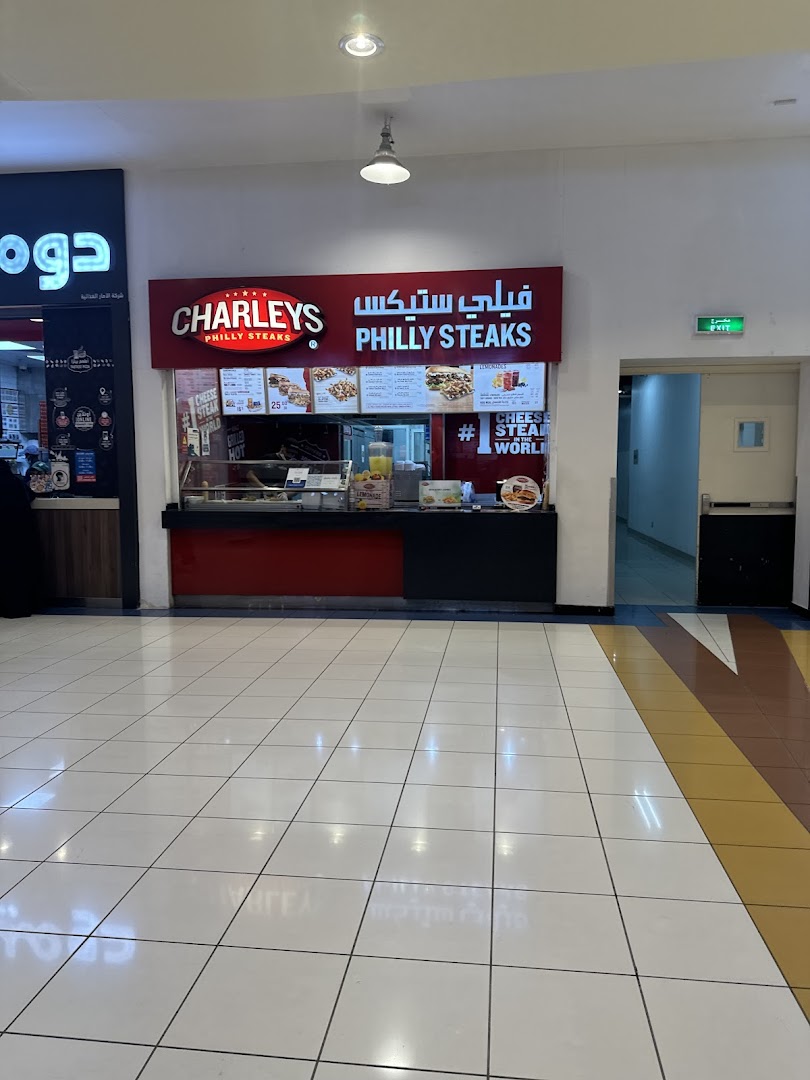 The Charleys Cheesesteaks shop front with its signature red and black branding.