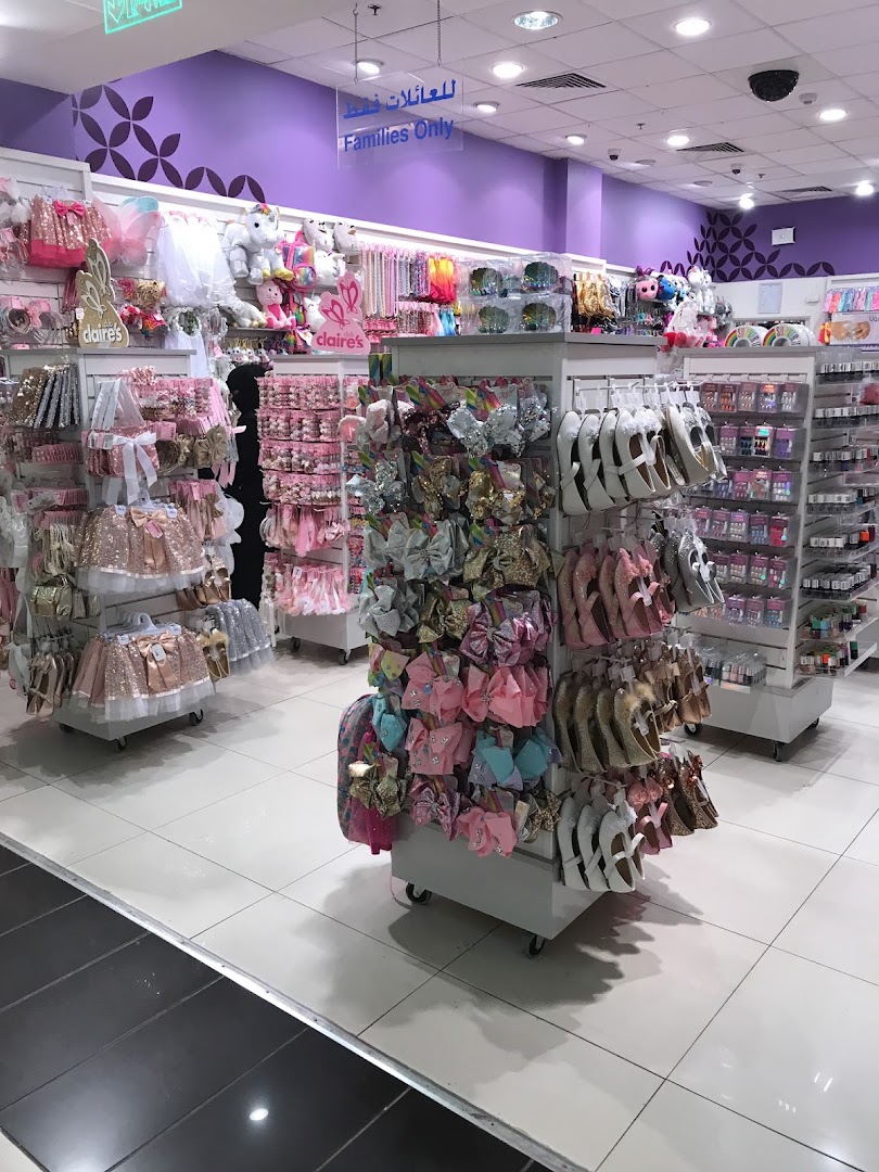 Interior view of a Claire's store filled with colorful accessories and clothing for girls.