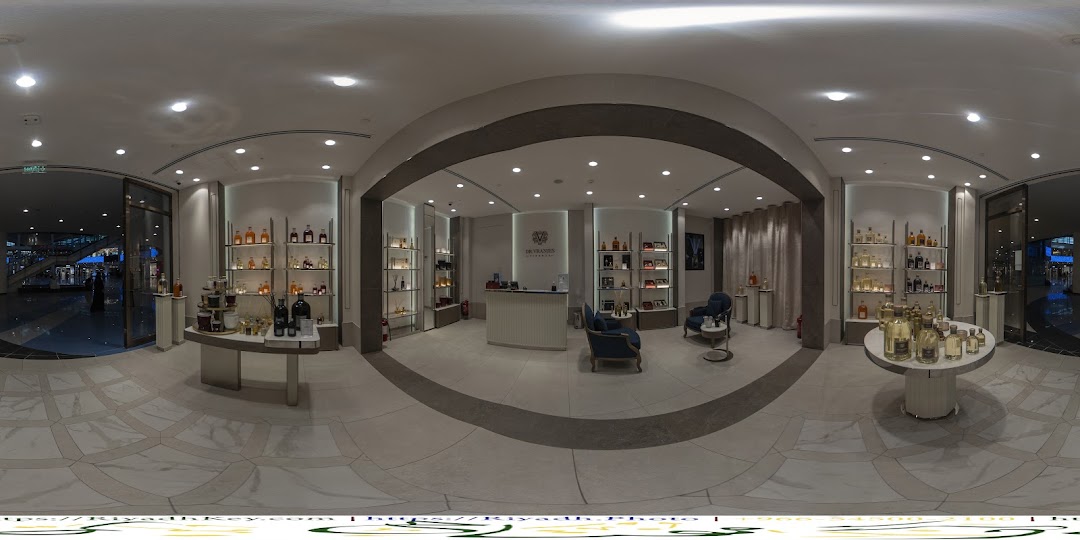 Interior view of a luxurious Dr. Vranjes perfume boutique showcasing a wide selection of fragrances.