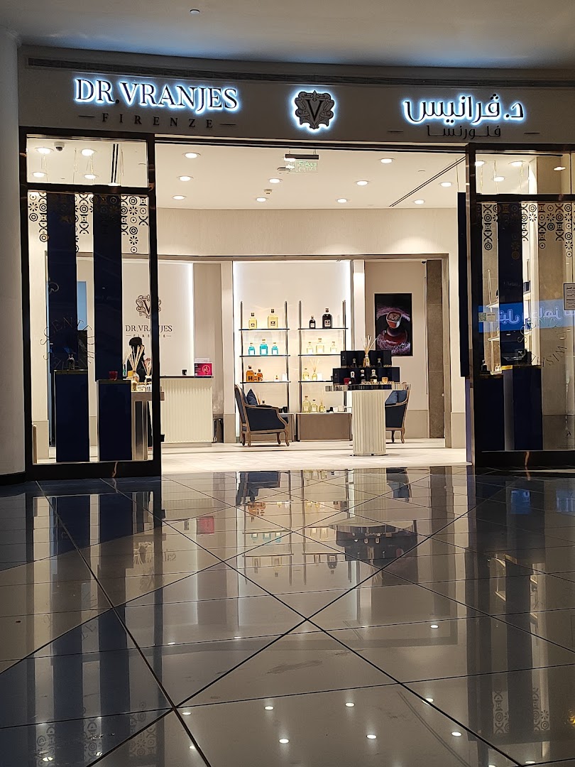 The entrance of a Dr. Vranjes Firenze store, showcasing elegant displays of perfumes and home fragrances.