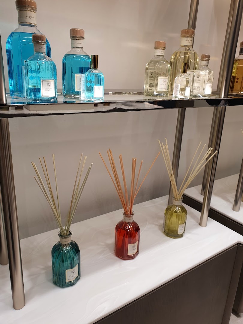 Dr. Vranjes shop interior displaying various scented diffuser bottles and reed diffusers.