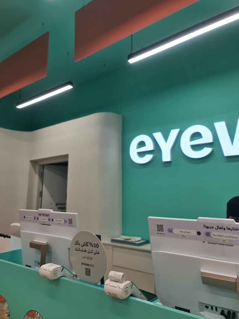 Interior view of an Eyewa store with the brand logo and checkout counters.