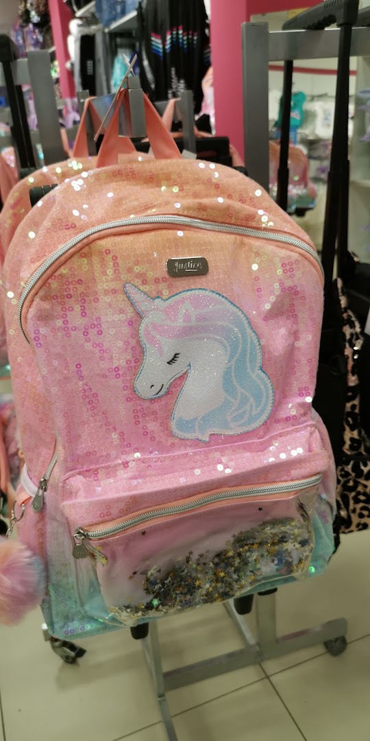 A pink sequined backpack with a unicorn design and a clear front pocket filled with glitter.