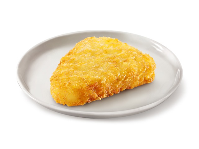 A golden-brown hash brown patty served on a white plate against a white background.
