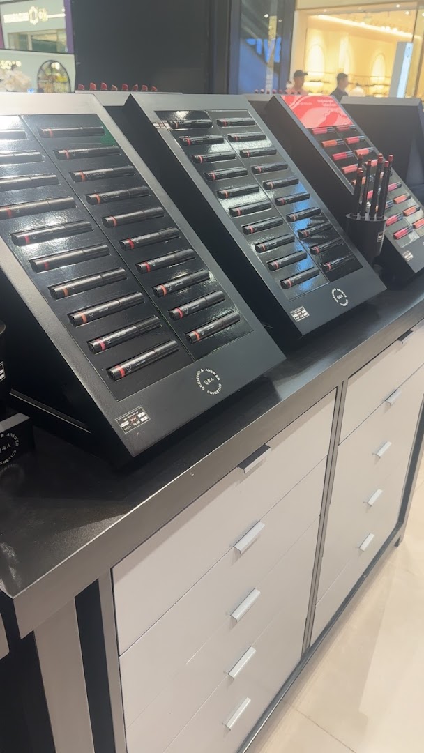A display of lipsticks and lip liners from the brand QA.