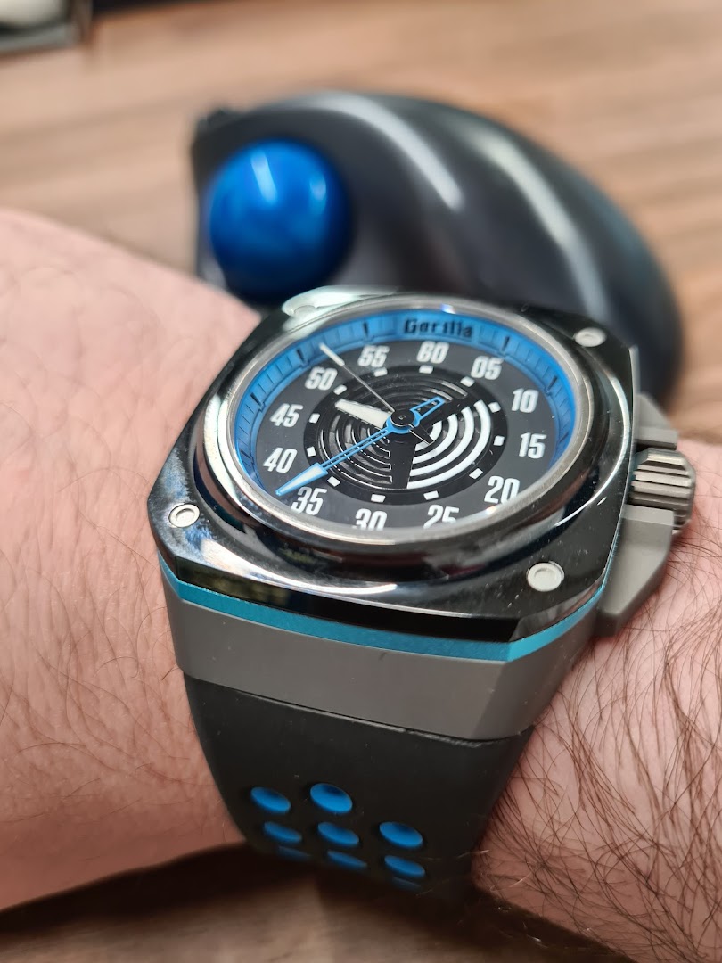 A close-up shot of a stylish Gorilla watch with a blue and black design on a person's wrist.