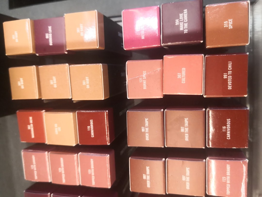 A collection of M.A.C lipstick boxes in various shades and shades.
