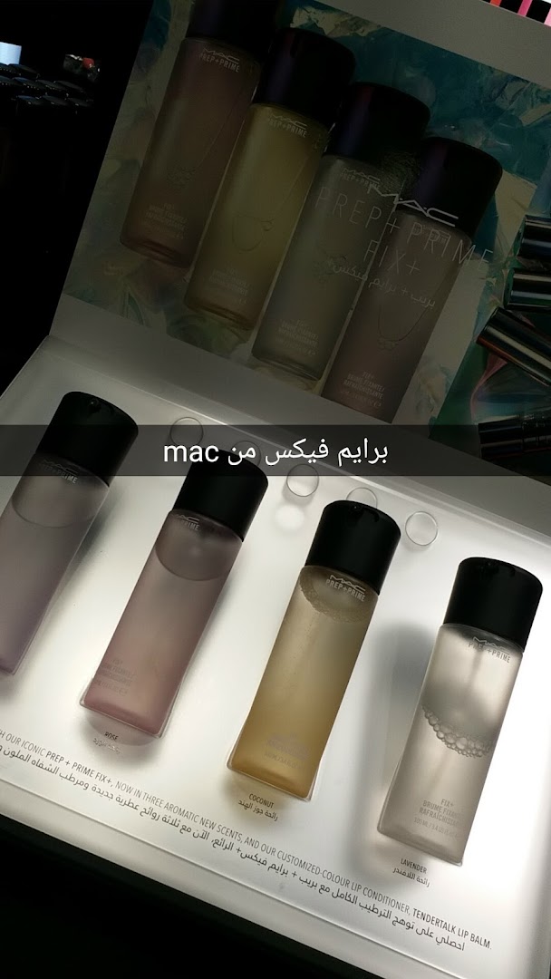 A display of MAC Prep + Prime Fix+ sprays in various scents and a lip balm.