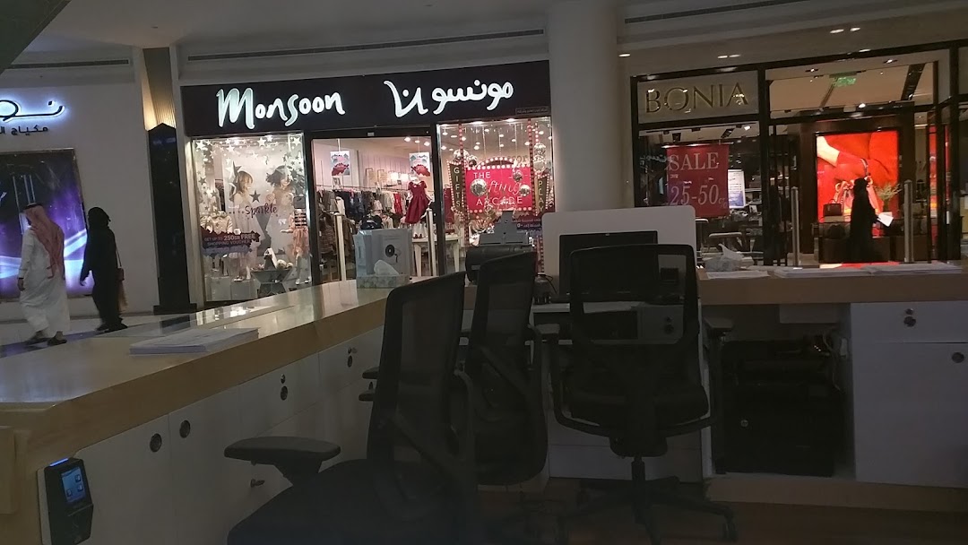 The Monsoon Accessorize shop front with displays of clothing and accessories.