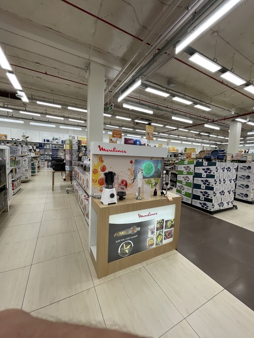 A display stand featuring Moulinex kitchen appliances in a retail store.