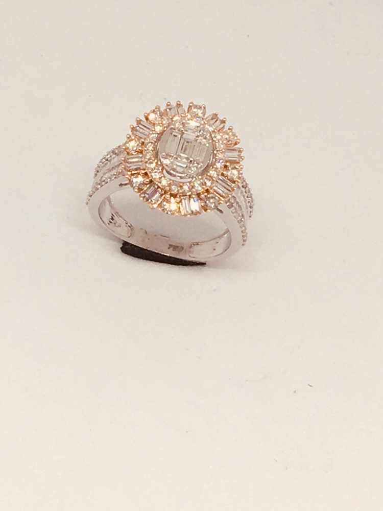 A stunning diamond ring with a central oval-cut diamond surrounded by smaller diamonds.