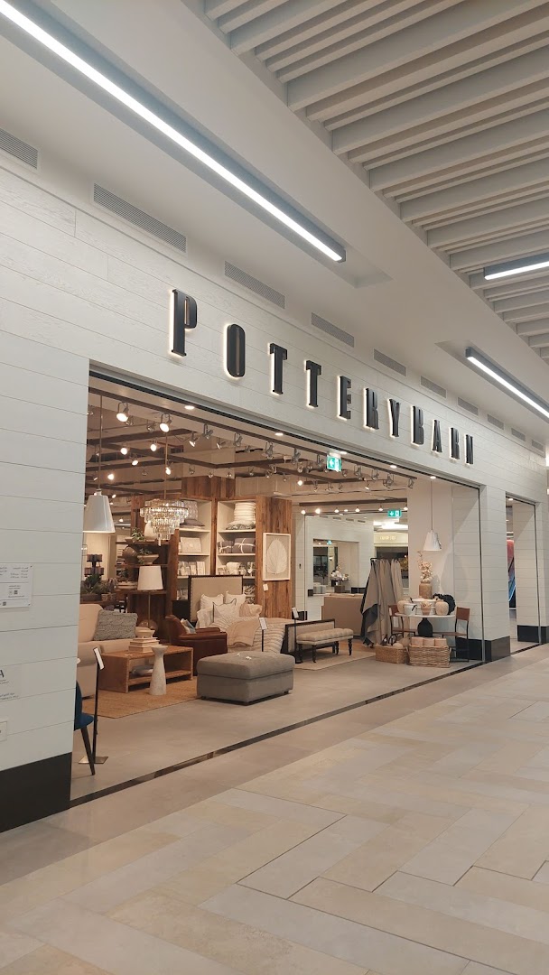 The Pottery Barn store entrance showcasing stylish furniture and home decor.