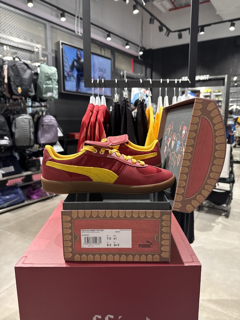 Puma store interior featuring Harry Potter themed sneakers on display.