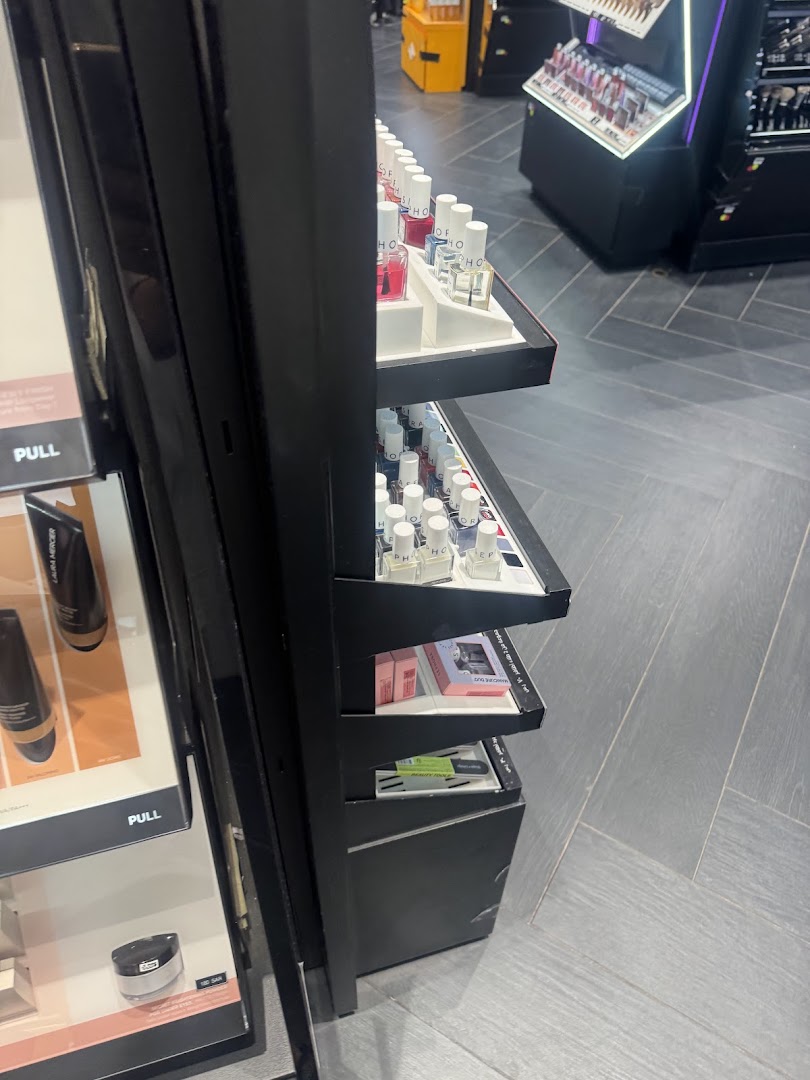 Interior view of a Sephora store showcasing various beauty products on display shelves.