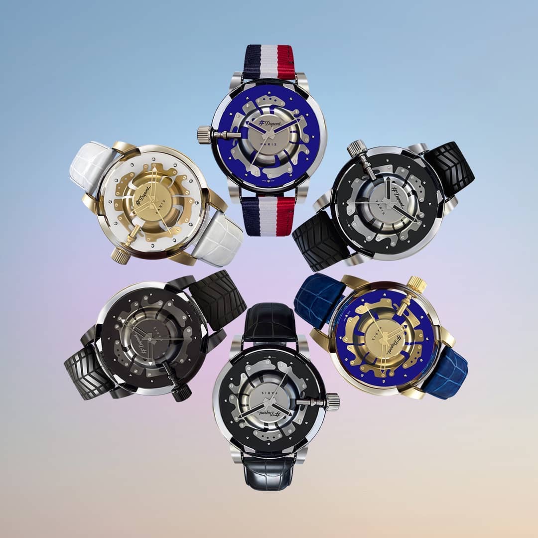 A collection of six luxury watches with intricate designs and various strap options.