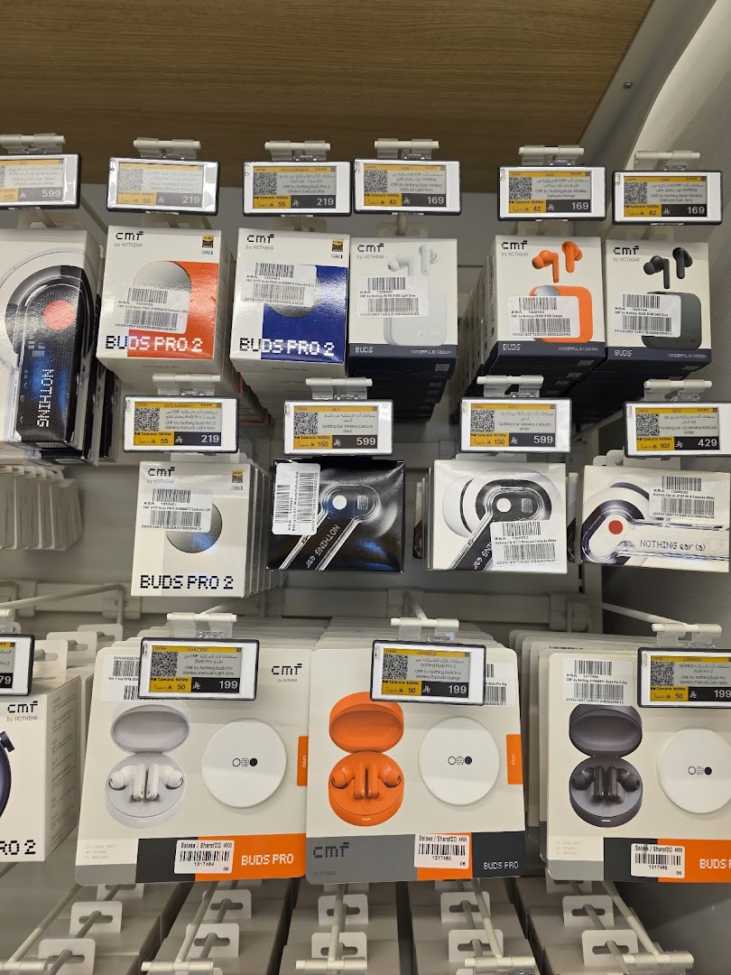 A display of various wireless earbuds and headphones from the brand Nothing.