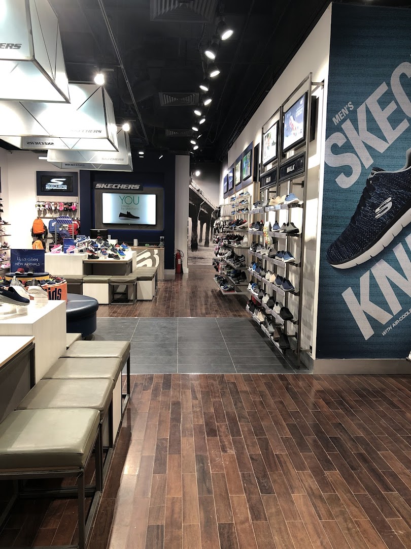 Interior view of a Skechers store showcasing various shoes and displays.