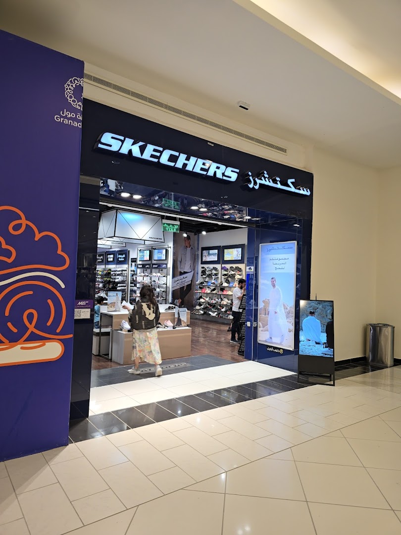 The entrance to a Skechers store in Granada Mall, showcasing shoes and apparel.