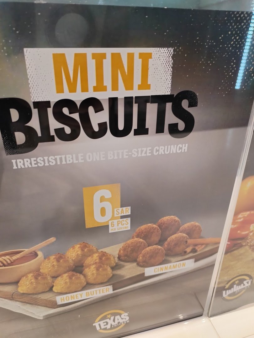 A display of Texas Chicken's mini biscuits in honey butter and cinnamon flavors.