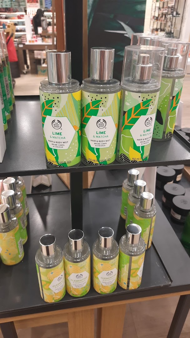 The Body Shop display featuring Lime & Matcha and Clementine hair and body mists.