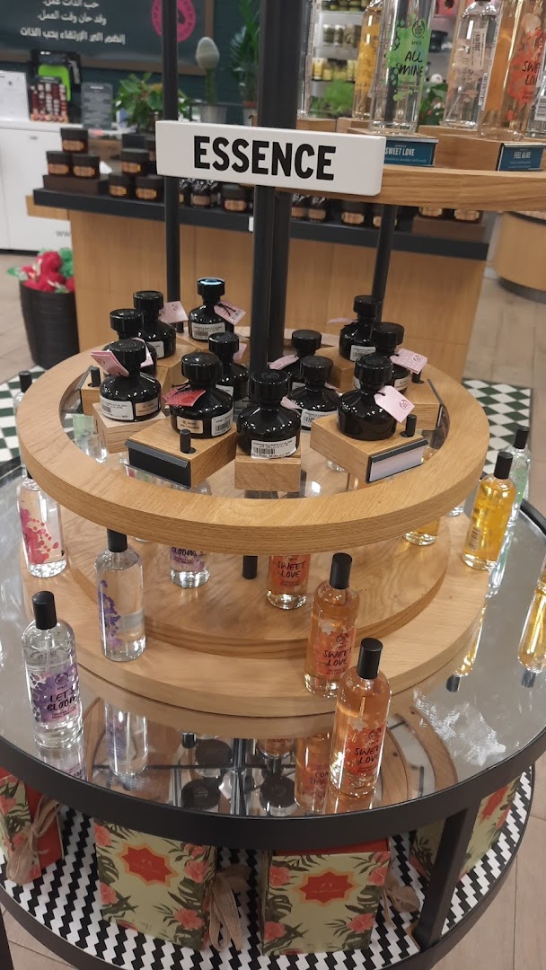 A display of various perfumes and body care products from The Body Shop.