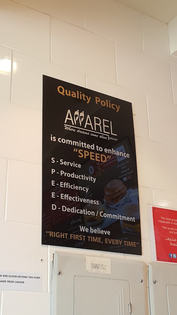 A sign detailing a quality policy with the acronym SPEED and a slogan about being right first time.