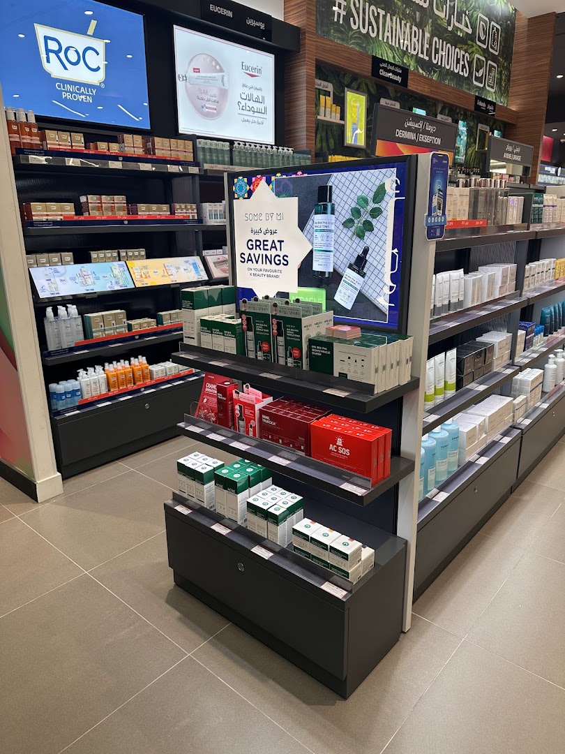 A well-lit Watsons store aisle showcasing various skincare products and promotions.