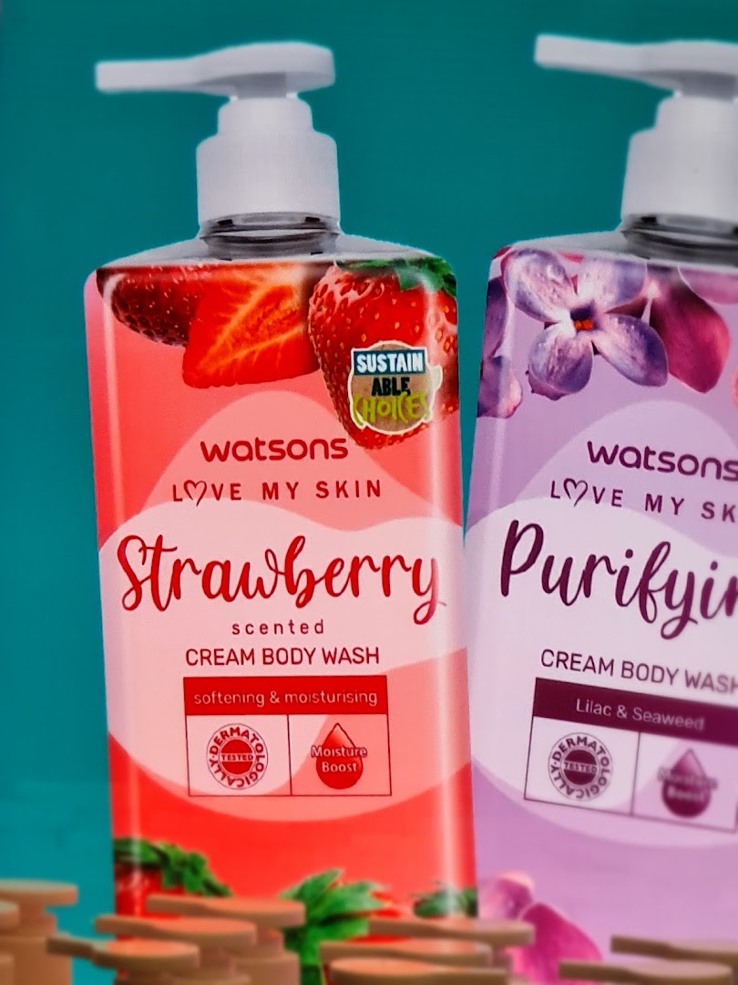 Two bottles of Watsons cream body wash, one strawberry scented and the other lilac & seaweed.