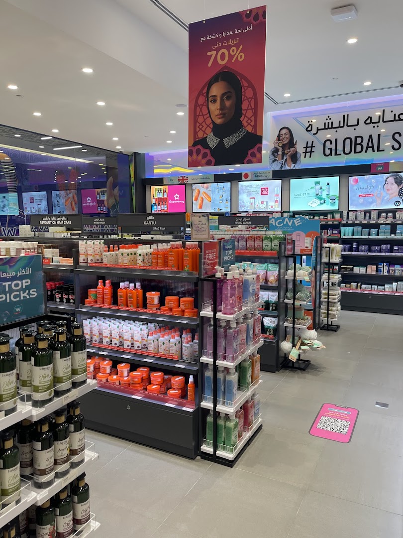 Interior view of a Watsons store showcasing beauty products and a 70% off sale banner.